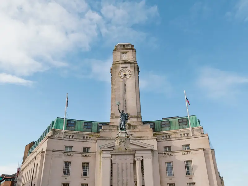 Luton Town Hall and its clock tower under a clear blue sky